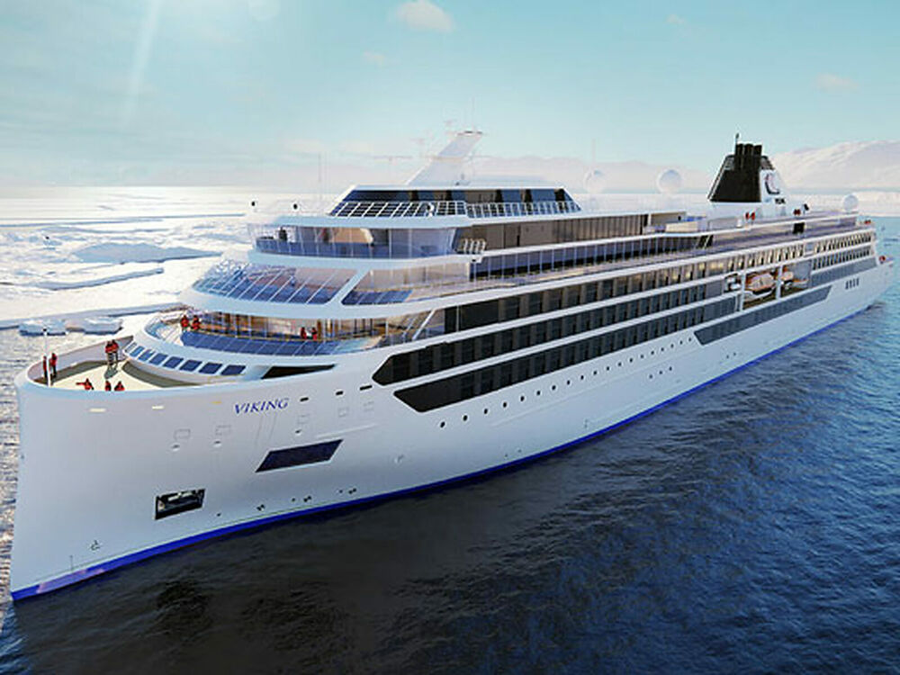 Viking Octantis, a sleek white expedition ship, cruises through icy polar waters