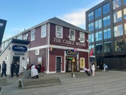 The red Cable Wharf building on the Halifax boardwalk