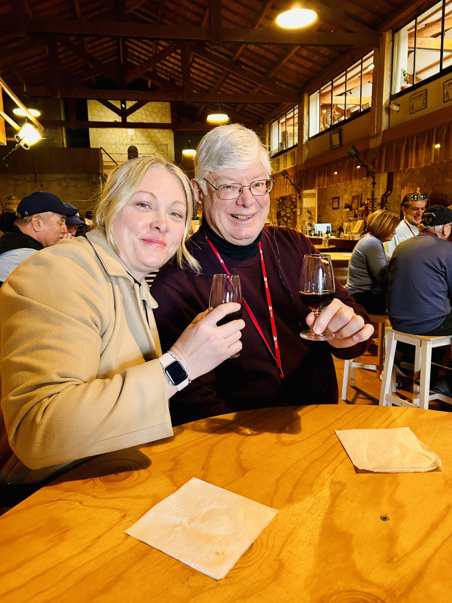 Sarah and Lewis toast with glasses of red wine during a Châteauneuf-du-Pape wine tasting excursion