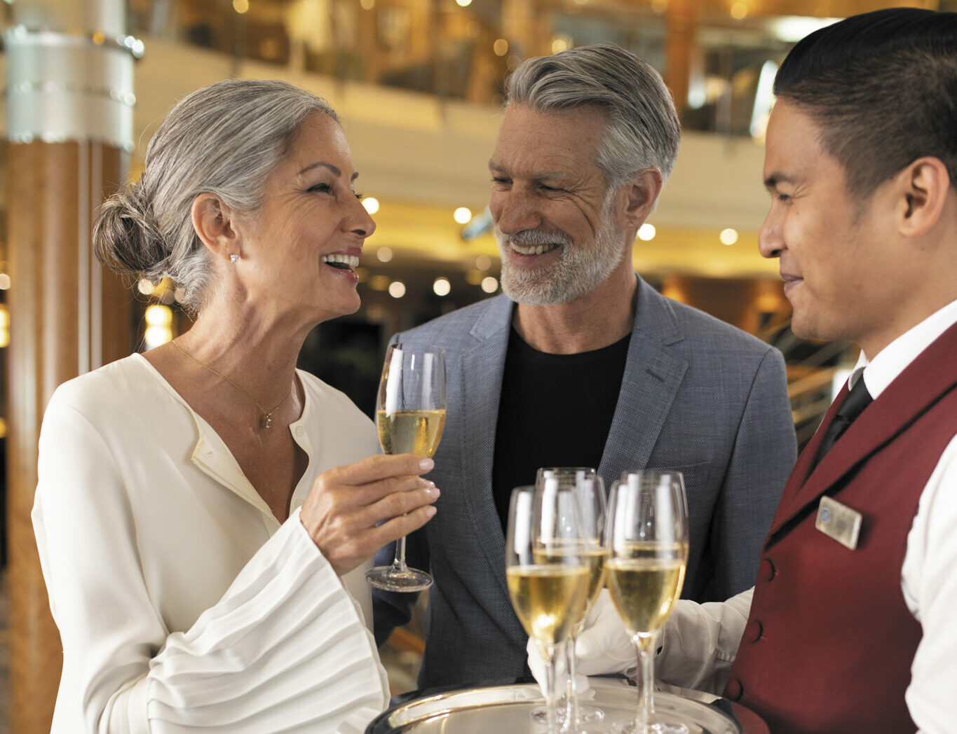 Cruise guests at a luxury champagne welcome reception